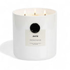 AEMBR Juletid luxury scented candle with three flames in a white jar, Christmas spices aroma.