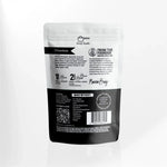 Back of AEMBR laundry powder pouch showing non-toxic detergent ingredients, usage directions, and founder note.