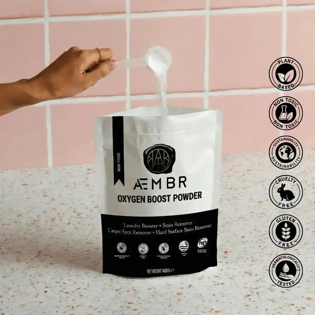 AEMBR non-toxic oxygen boost powder laundry booster with scoop, plant-based, cruelty-free.
