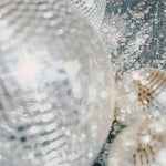 Close-up of decorative glass balls with a textured surface