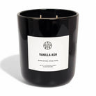 AEMBR Vanilla Ash candle in a sleek black jar with white label, non-toxic home fragrance.