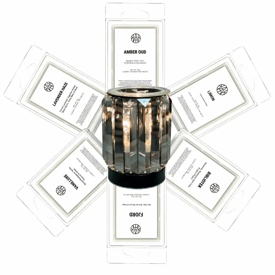 AEMBR wax melt bundle with six fragrance packs and black glass wax warmer, clean white background
